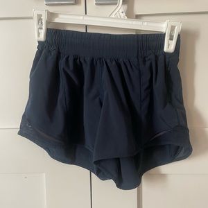 Size 4 Navy Blue Lululemon Hotty Hot shorts 4”